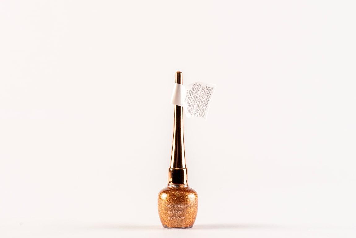 Miniatura Pack de 24 unidades Delineador de ojos efecto glitter "WOW" tonos dorados, blancos y bronces