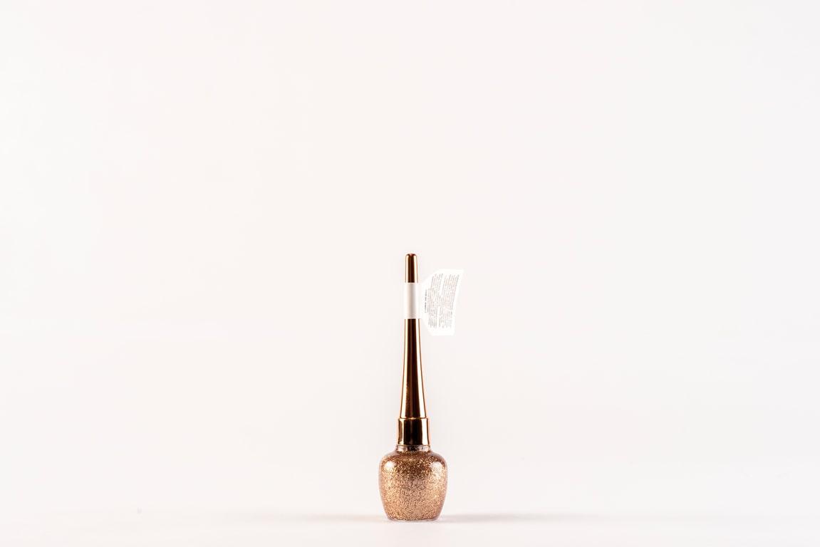 Miniatura Pack de 24 unidades Delineador de ojos efecto glitter "WOW" tonos dorados, blancos y bronces