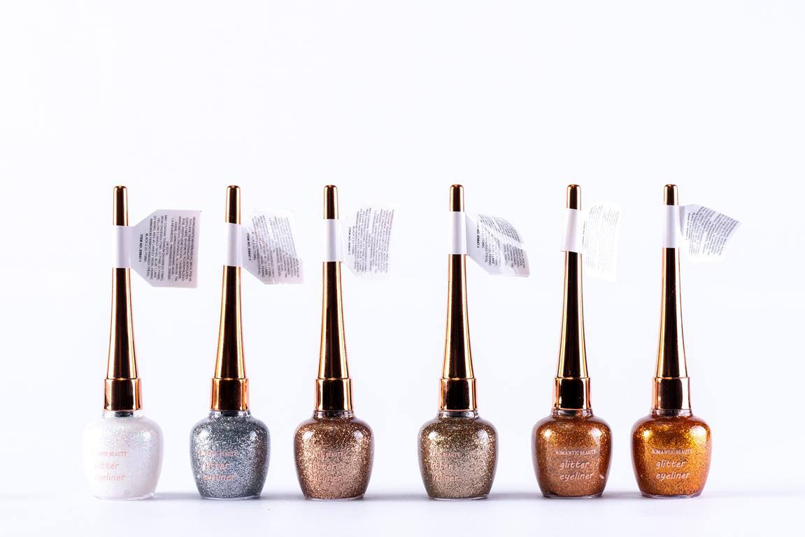 Pack de 24 unidades Delineador de ojos efecto glitter "WOW" tonos dorados, blancos y bronces